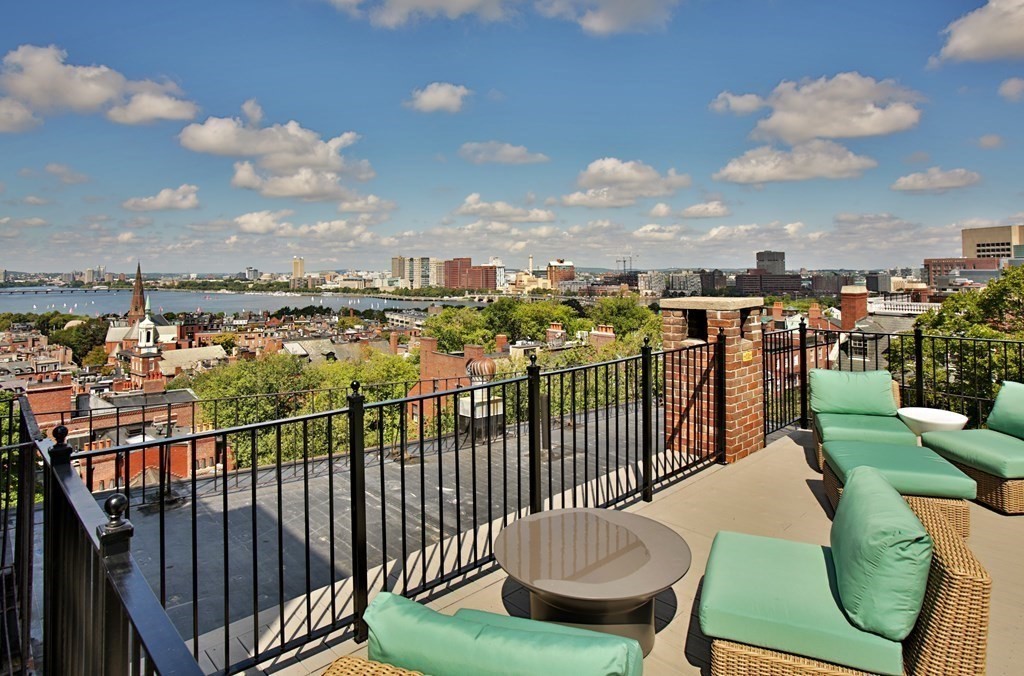 27 Chestnut Street, Unit 1B Boston, MA 02108 - Photo 12 of 14 a view of a balcony with chairs