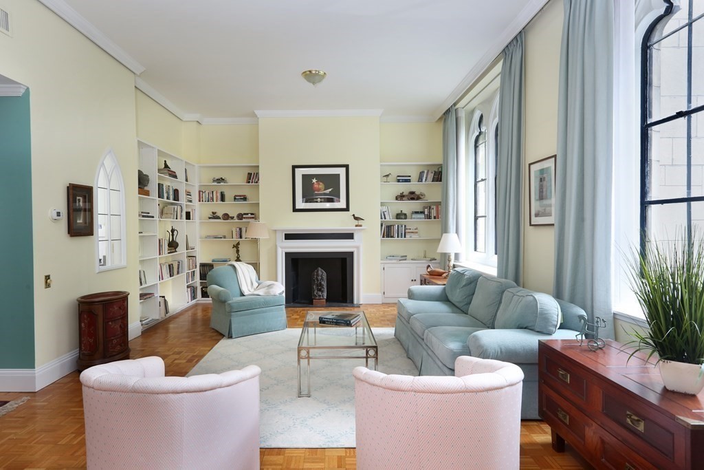 27 Chestnut Street, Unit 1B Boston, MA 02108 - Photo 2 of 14 a living room with furniture a fireplace and a large mirror