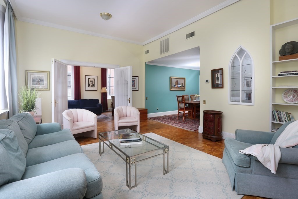 27 Chestnut Street, Unit 1B Boston, MA 02108 - Photo 3 of 14 a living room with furniture and a table
