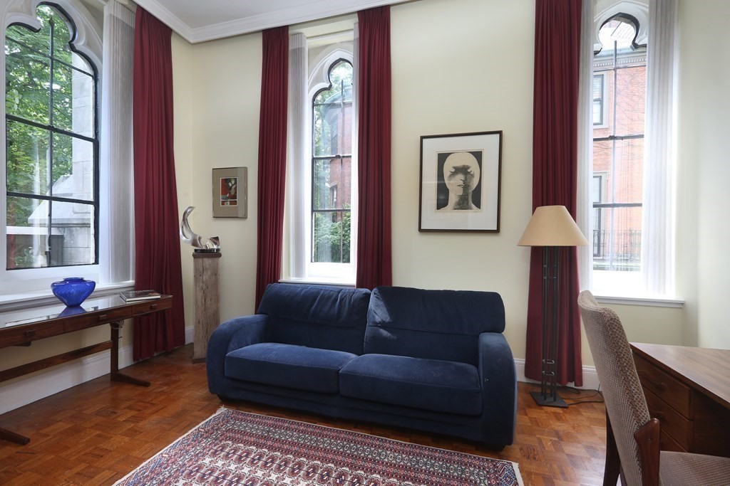 27 Chestnut Street, Unit 1B Boston, MA 02108 - Photo 5 of 14 a living room with furniture and a window