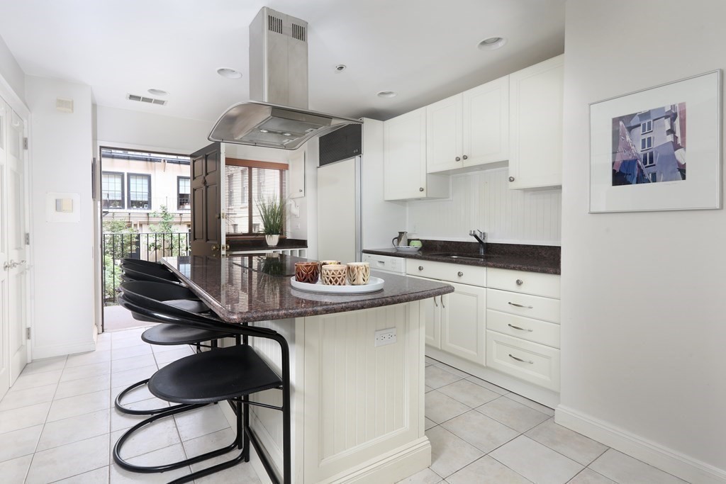 27 Chestnut Street, Unit 1B Boston, MA 02108 - Photo 7 of 14 a view of workspace with furniture and window