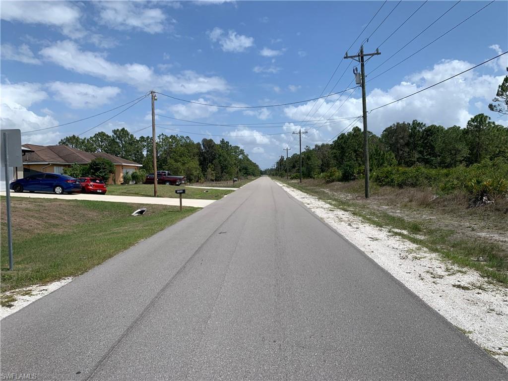 1537 Meadow Road Lehigh Acres, FL 33976 - Photo 3 of 4 a view of a park with swings