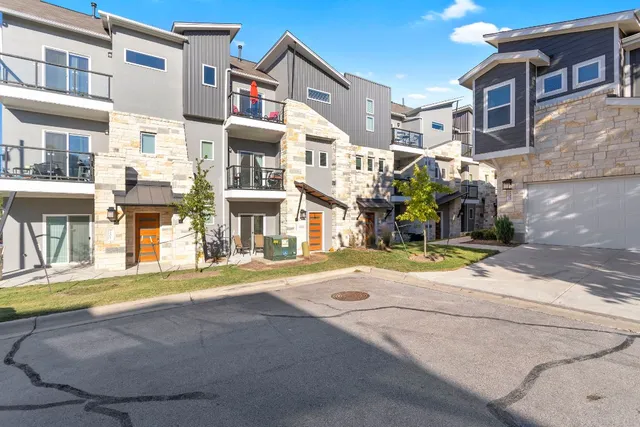 a view of a street with buildings