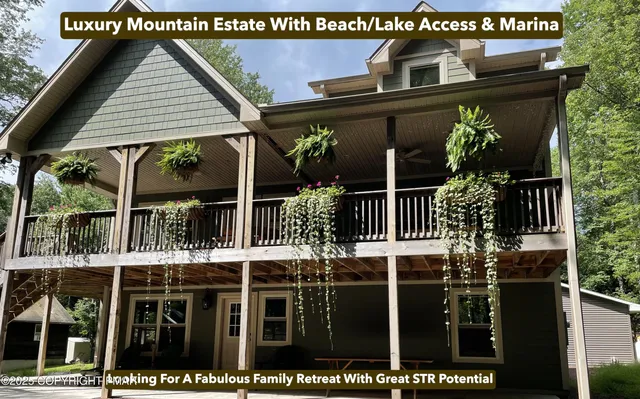 a living room with furniture fireplace and a large window