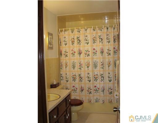 337 East Greystone Road Old Bridge, NJ 08857 - Photo 14 of 22 a bathroom with a sink and a shower