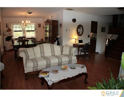 337 East Greystone Road Old Bridge, NJ 08857 - Photo 7 of 22 a living room with furniture and wooden floor