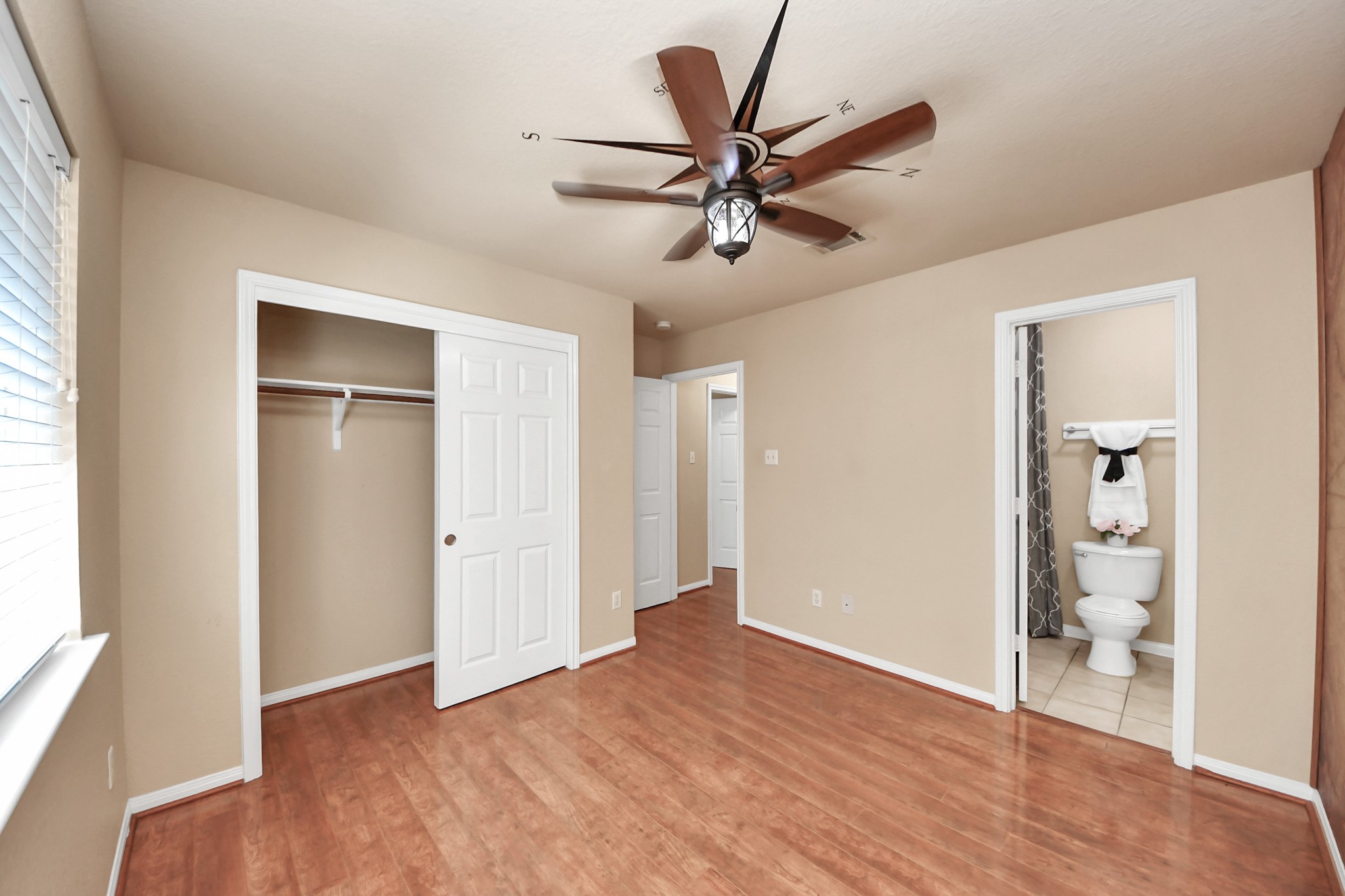 19123 Center Park Drive Spring, TX 77373 - Photo 14 of 42 wooden floor in an empty room with a window