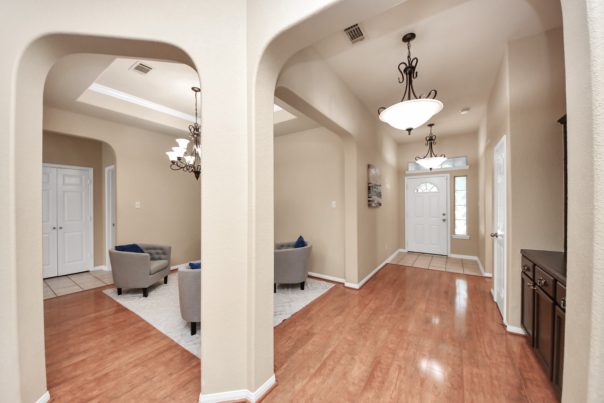 19123 Center Park Drive Spring, TX 77373 - Photo 15 of 42 a view of a room with wooden floor and a chandelier