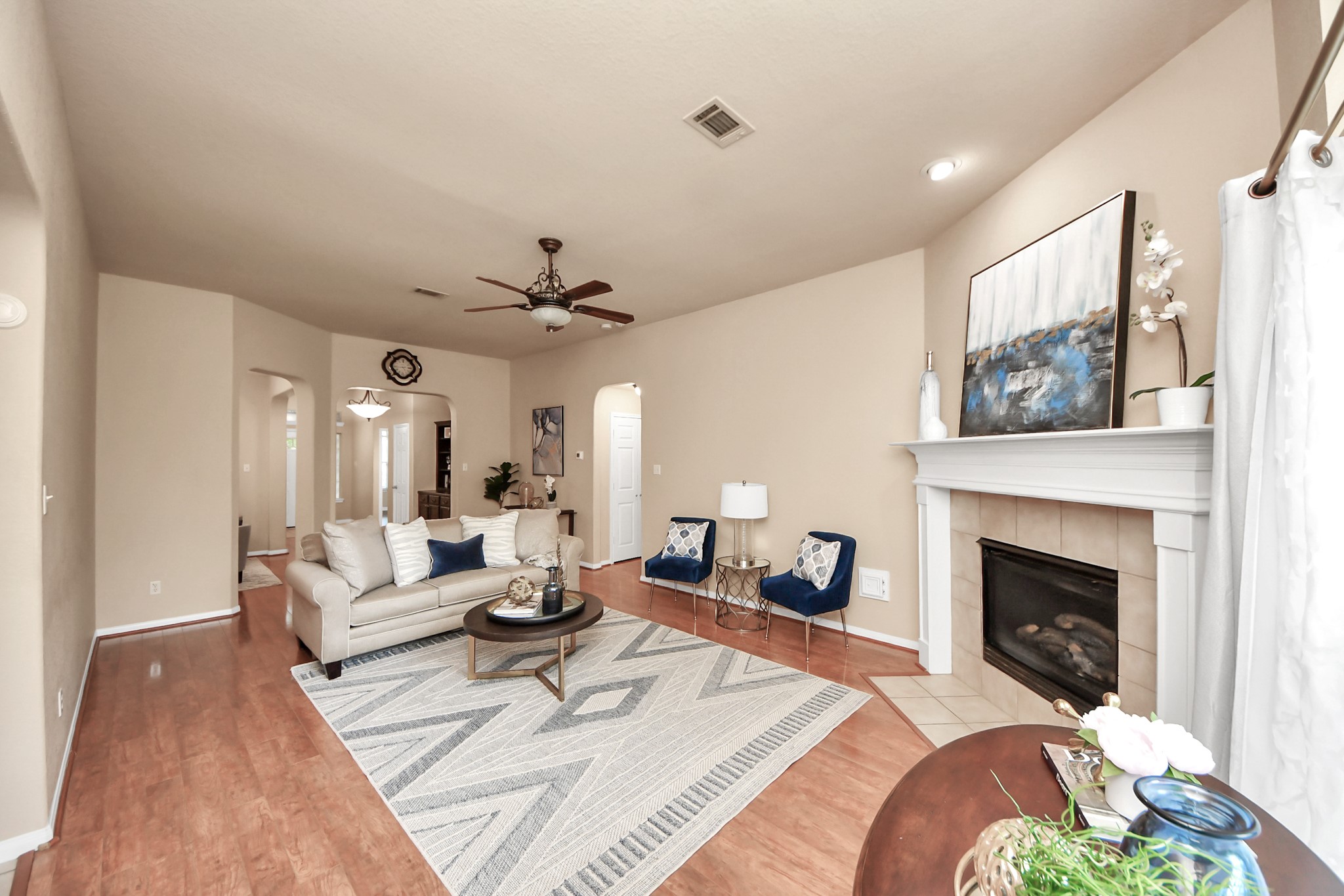 19123 Center Park Drive Spring, TX 77373 - Photo 18 of 42 a living room with furniture and a fireplace