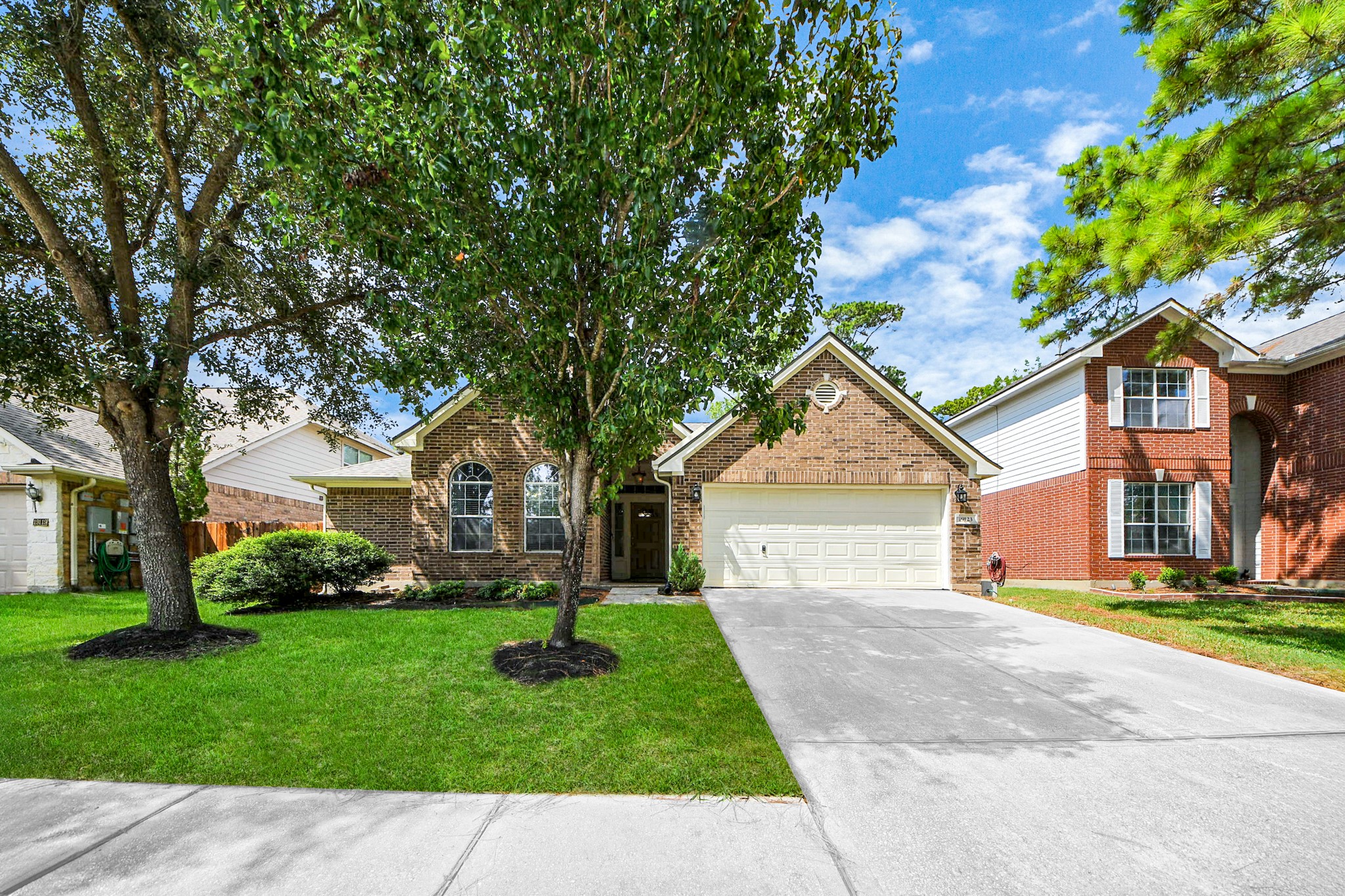 19123 Center Park Drive Spring, TX 77373 - Photo 2 of 42 front view of a house with a yard