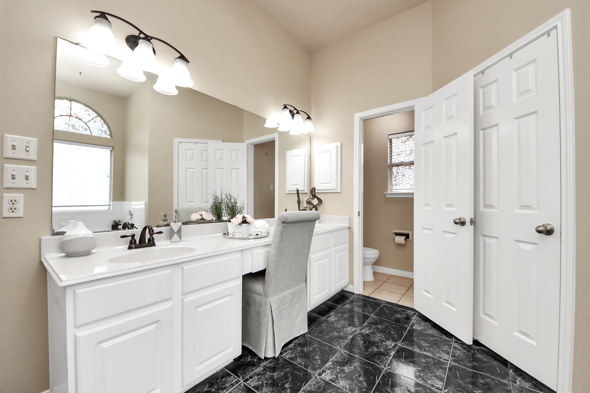 19123 Center Park Drive Spring, TX 77373 - Photo 28 of 42 a bathroom with a double vanity sink mirror and