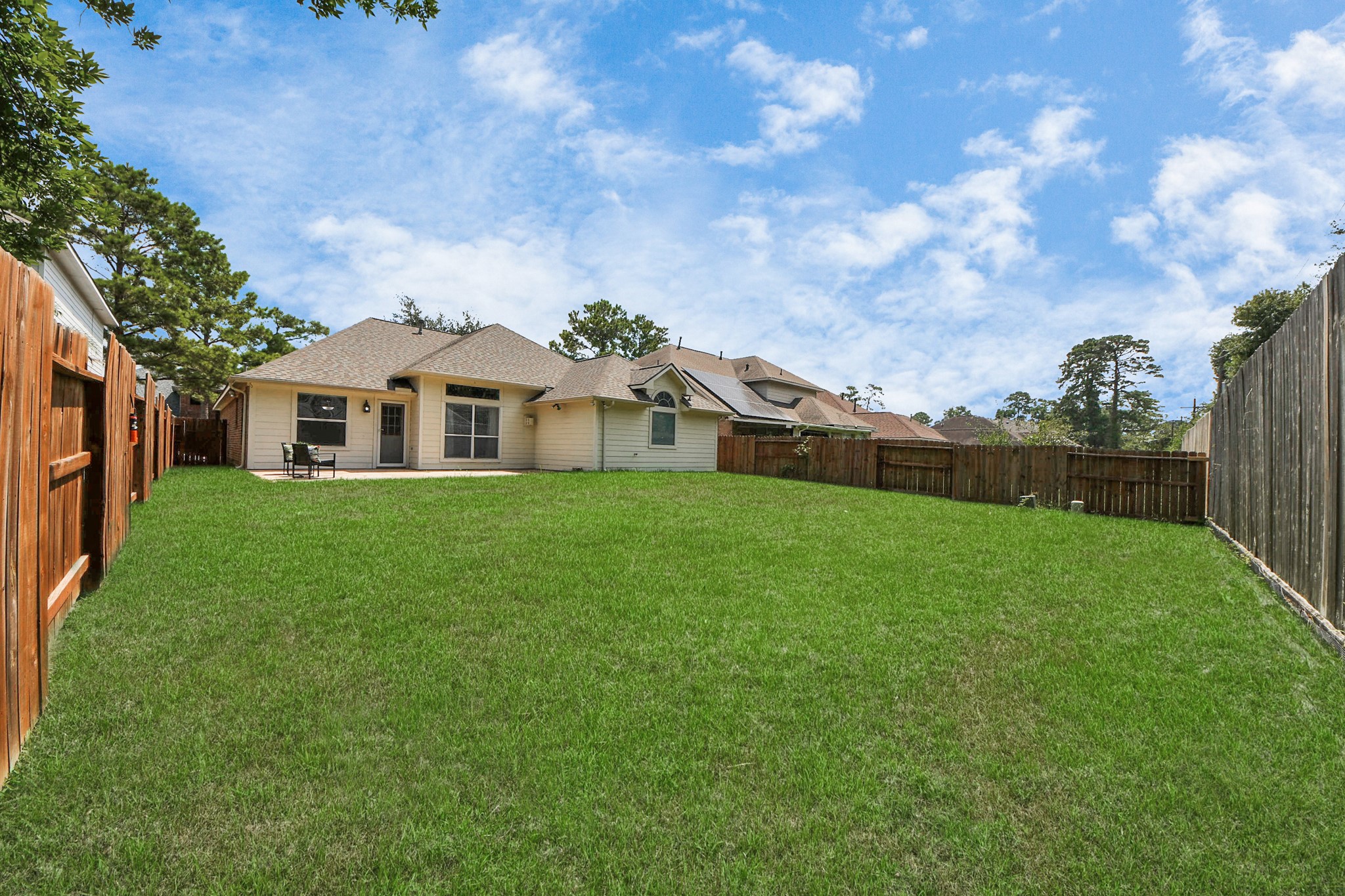 19123 Center Park Drive Spring, TX 77373 - Photo 39 of 42 a view of house in front of a big yard with large trees