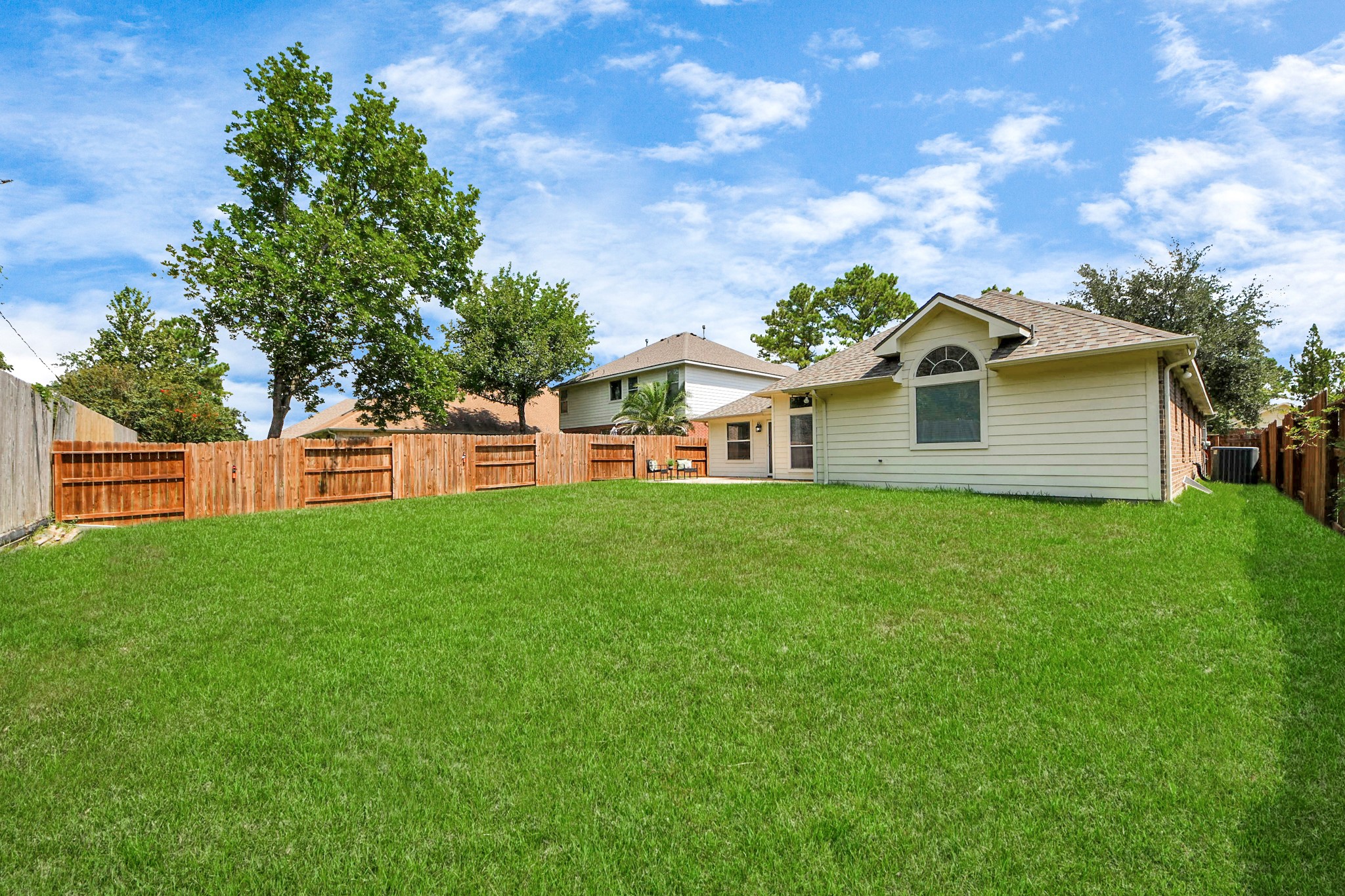 19123 Center Park Drive Spring, TX 77373 - Photo 40 of 42 a view of a yard in front of a house with a large tree