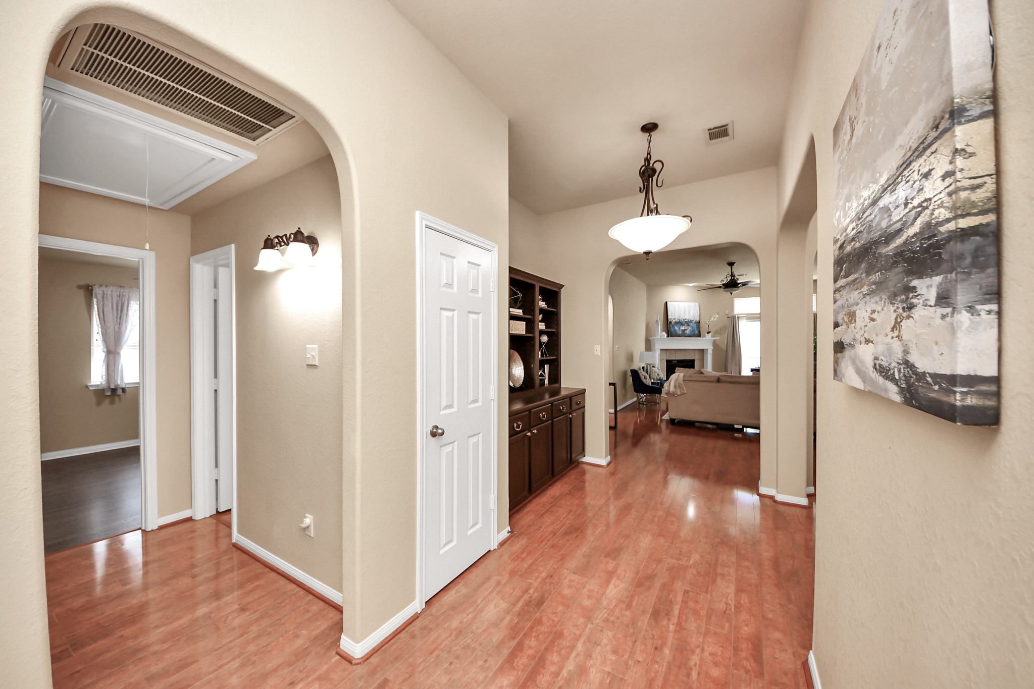 19123 Center Park Drive Spring, TX 77373 - Photo 7 of 42 a view of a hallway view with wooden floor and furniture