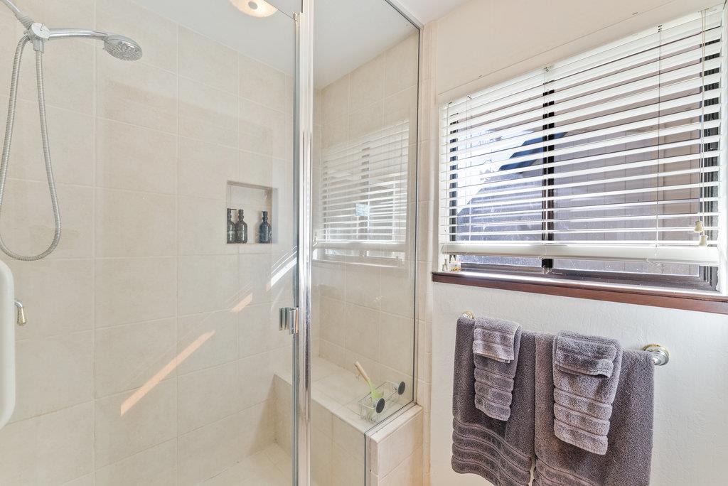 60 Robak Drive La Selva Beach, CA 95076 - Photo 19 of 44 a bathroom with a bathtub and shower