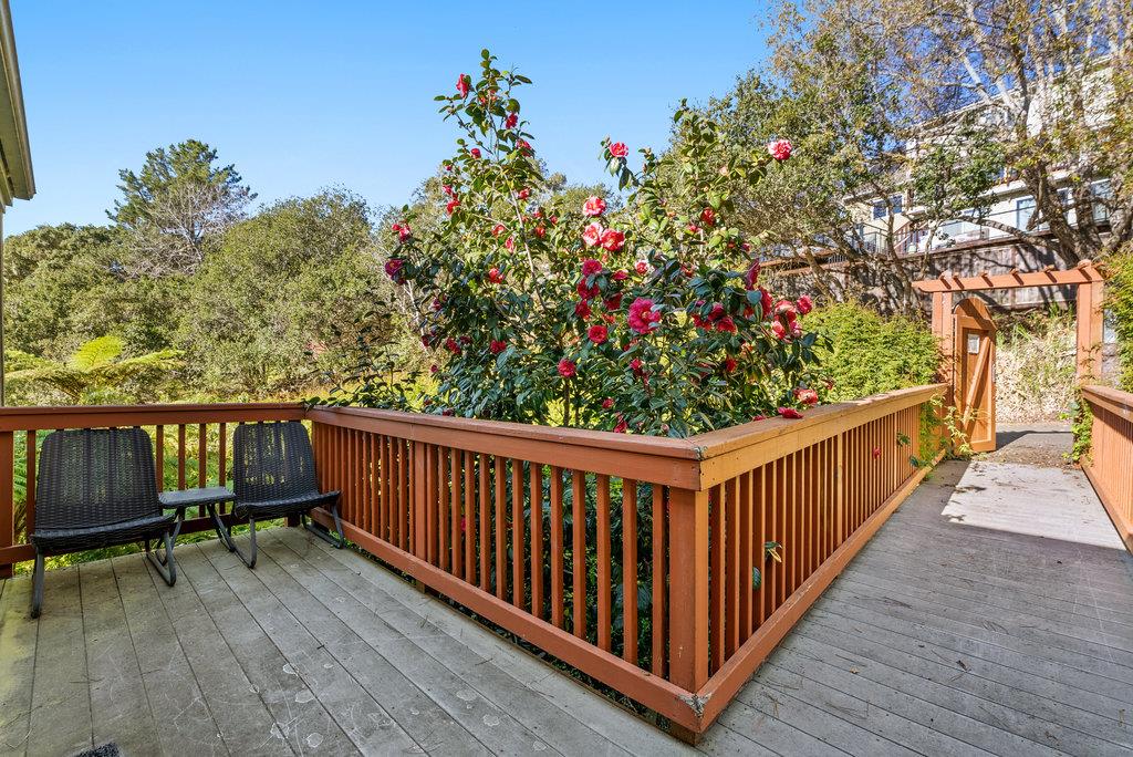 60 Robak Drive La Selva Beach, CA 95076 - Photo 20 of 44 a view of balcony with wooden floor and flowers