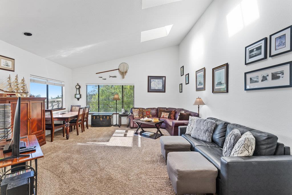 60 Robak Drive La Selva Beach, CA 95076 - Photo 6 of 44 a living room with furniture large window and a flat screen tv