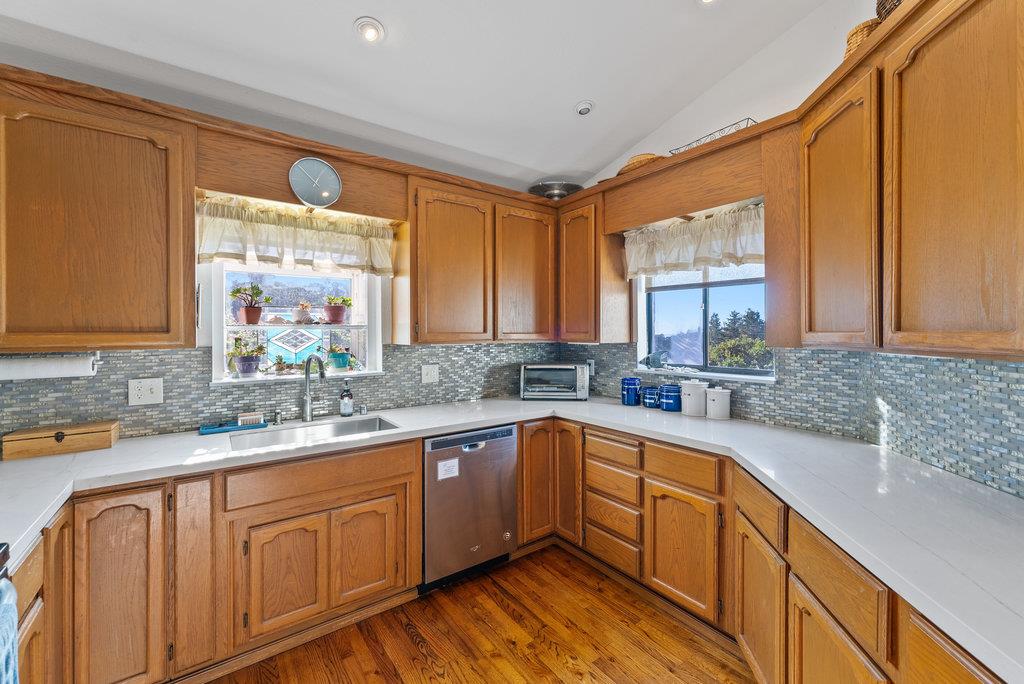 60 Robak Drive La Selva Beach, CA 95076 - Photo 8 of 44 a kitchen with a sink stove and cabinets