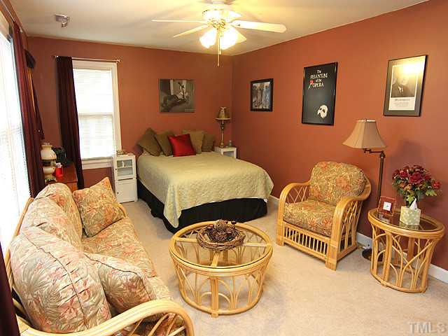 3805 Evander Way Raleigh, NC 27613 - Photo 14 of 23 One of the 2nd floor bedrooms-it is huge!