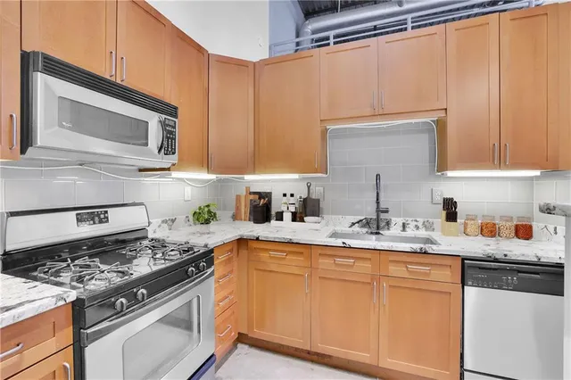 a view of a livingroom with furniture and porch