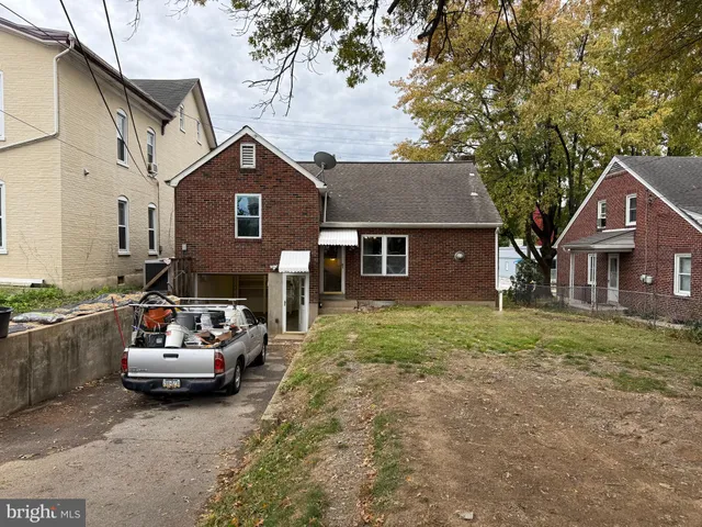 a car parked in front of a house