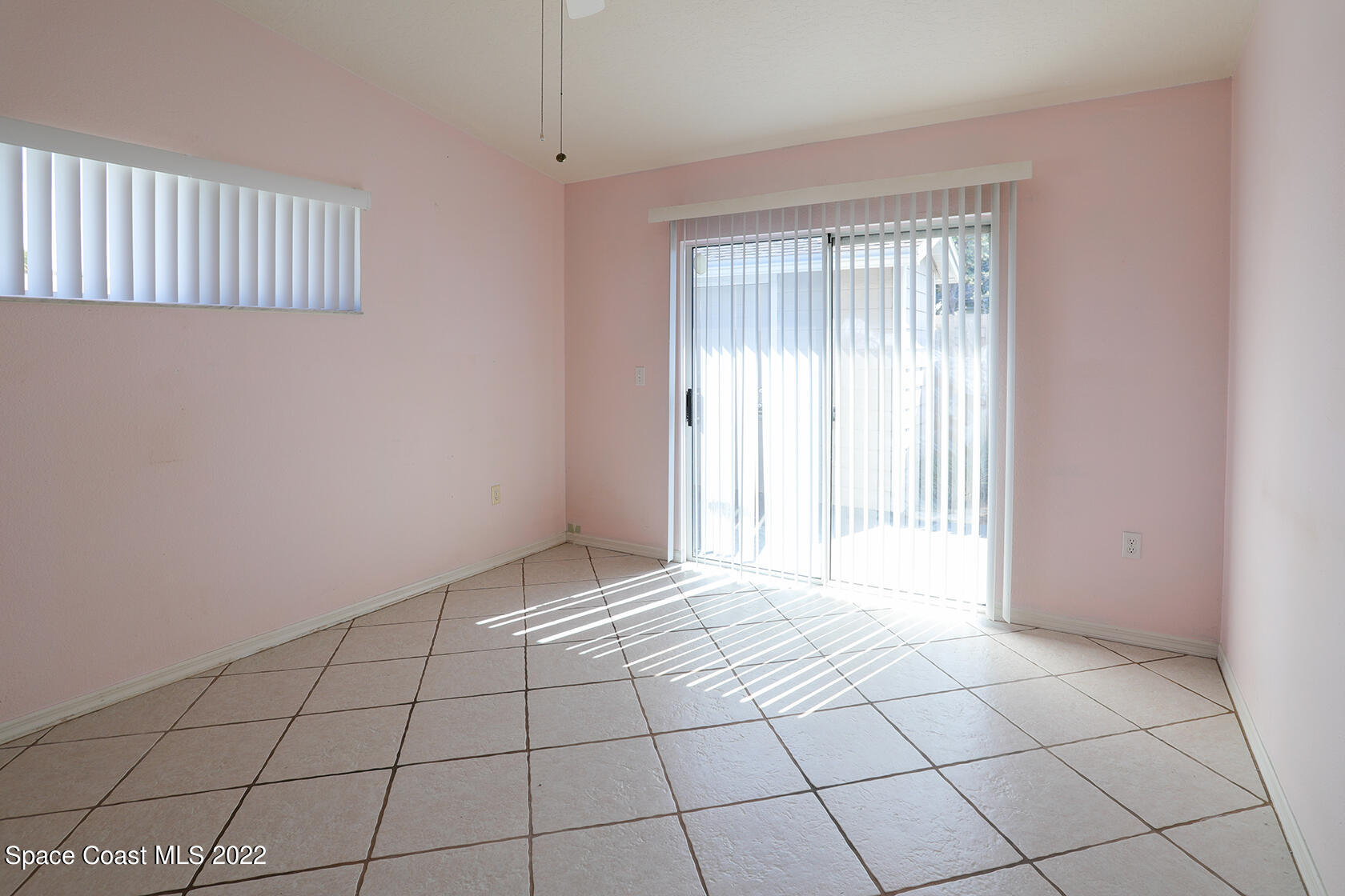 1943 Quail Ridge Court, Unit 604 Cocoa, FL 32926 - Photo 27 of 38 a view of an empty room and window