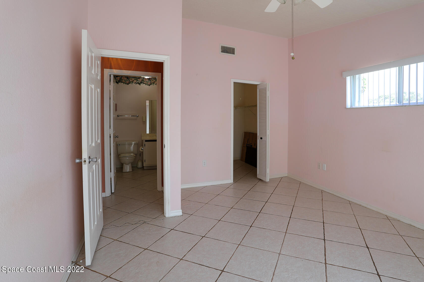 1943 Quail Ridge Court, Unit 604 Cocoa, FL 32926 - Photo 28 of 38 a view of an empty room and window