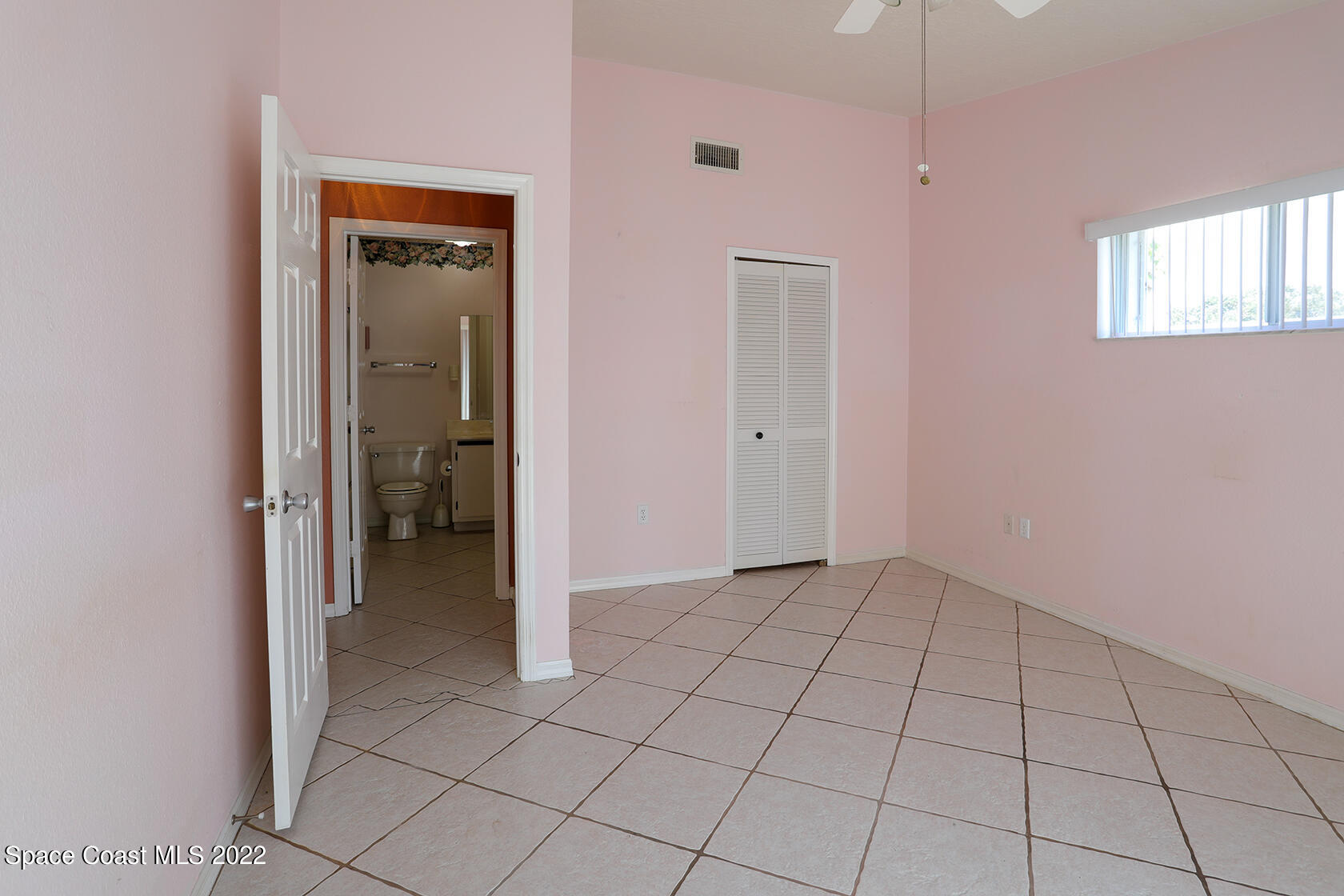 1943 Quail Ridge Court, Unit 604 Cocoa, FL 32926 - Photo 29 of 38 a view of an empty room and window