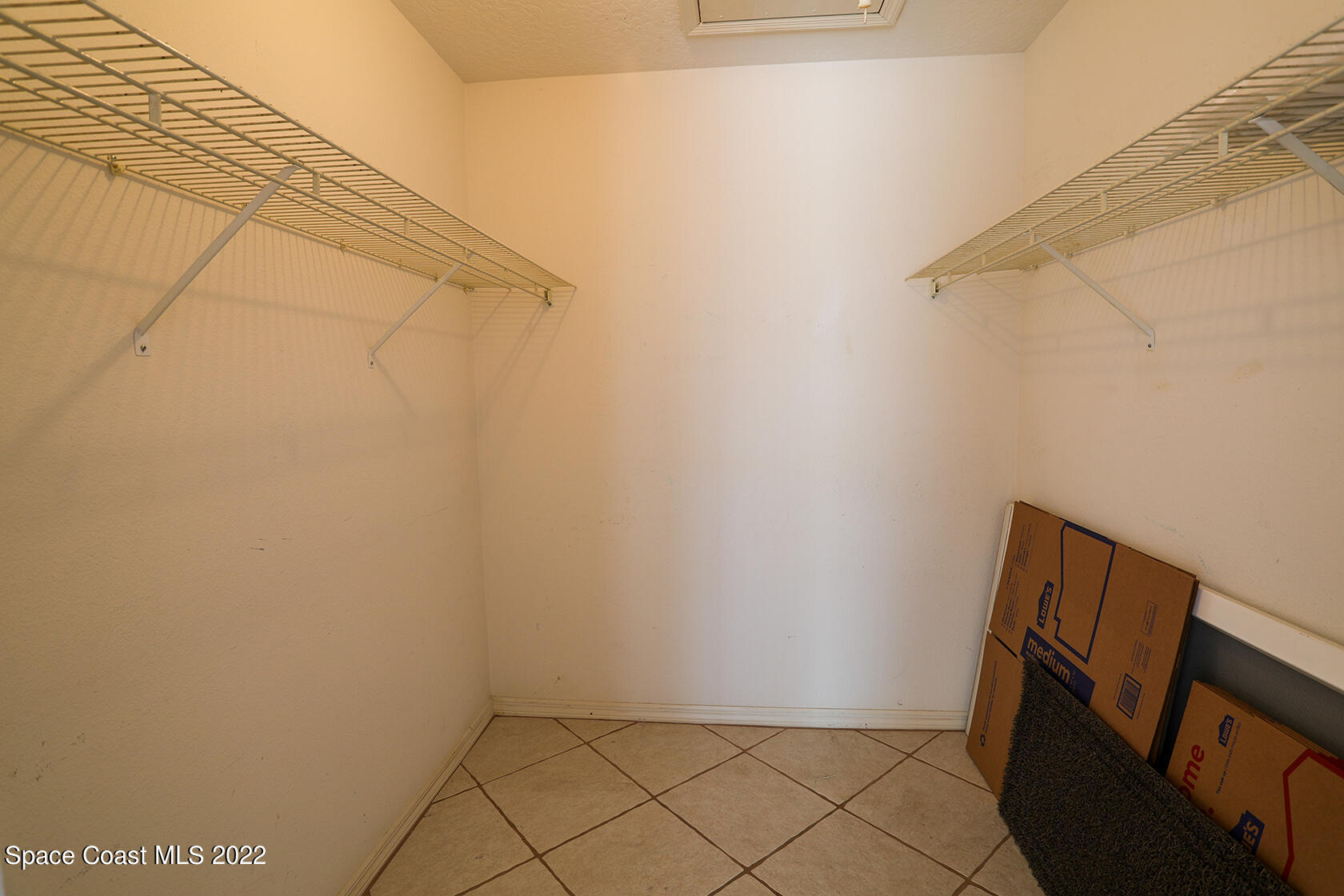 1943 Quail Ridge Court, Unit 604 Cocoa, FL 32926 - Photo 30 of 38 a view of utility room