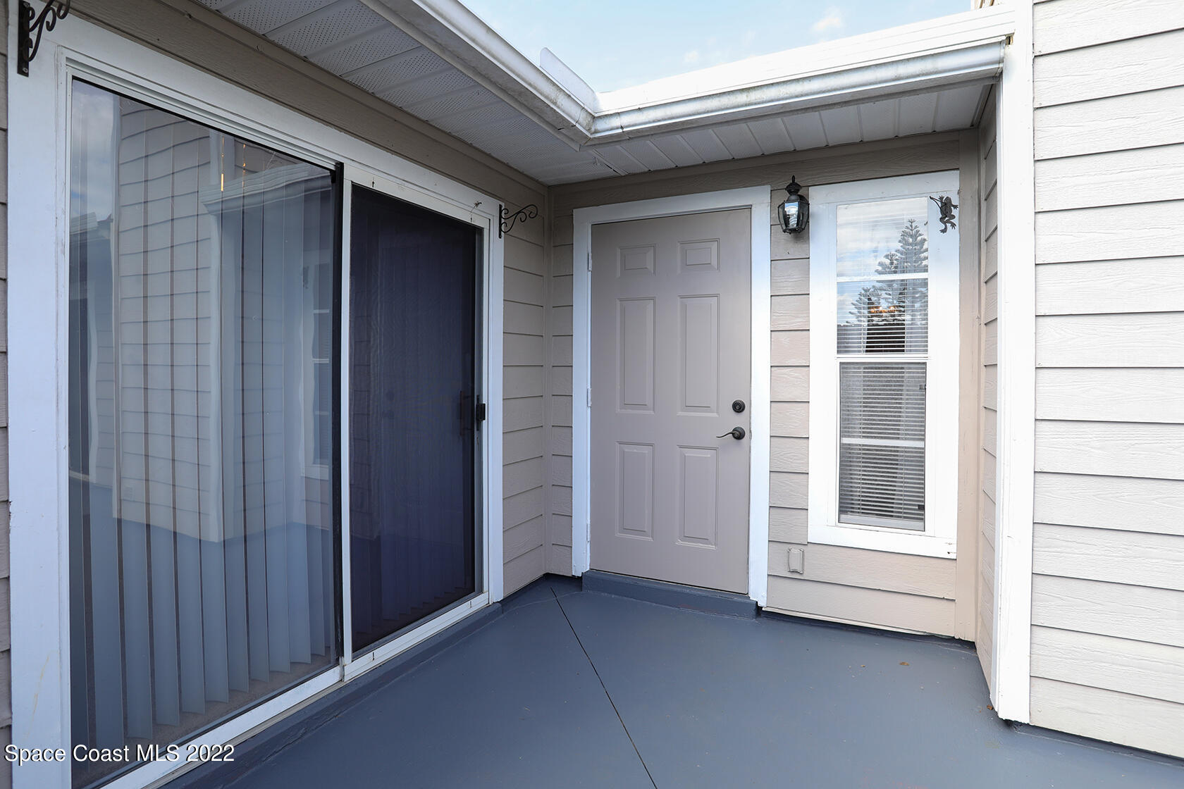 1943 Quail Ridge Court, Unit 604 Cocoa, FL 32926 - Photo 5 of 38 a view of an empty room with a window