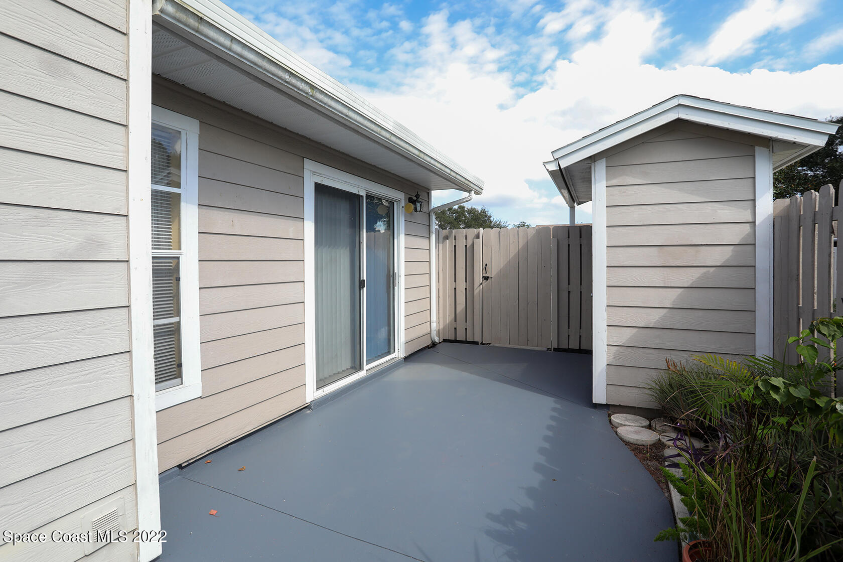 1943 Quail Ridge Court, Unit 604 Cocoa, FL 32926 - Photo 7 of 38 a view of small house with a outdoor space