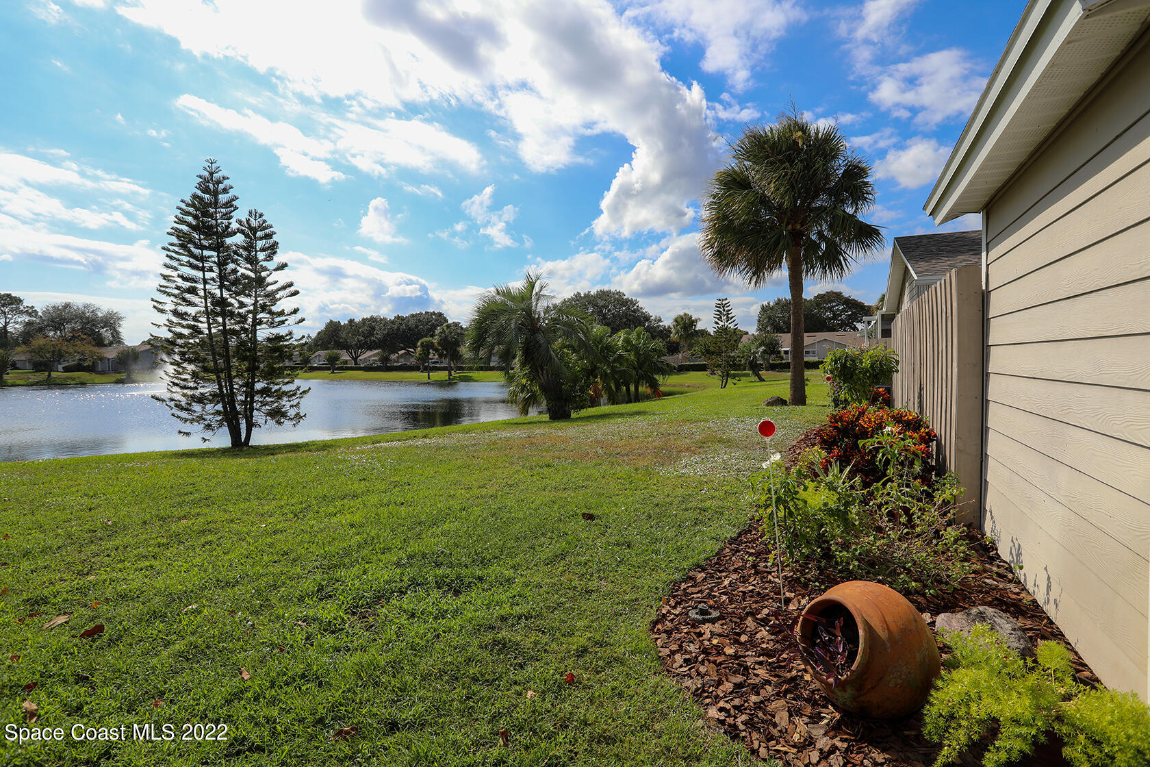 1943 Quail Ridge Court, Unit 604 Cocoa, FL 32926 - Photo 9 of 38 a view of a garden