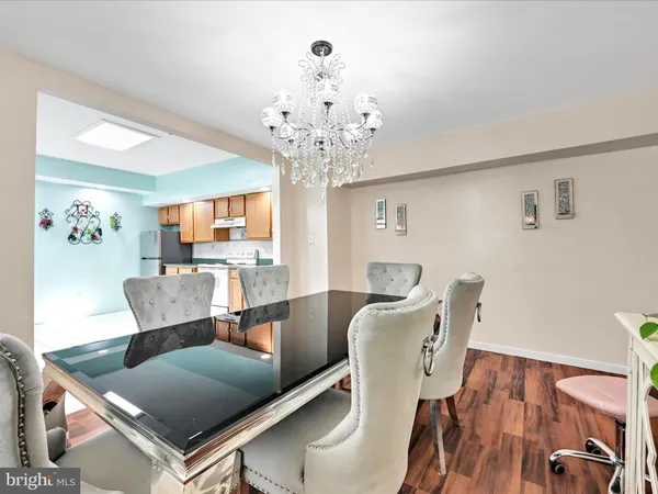 a living room with a table and a window