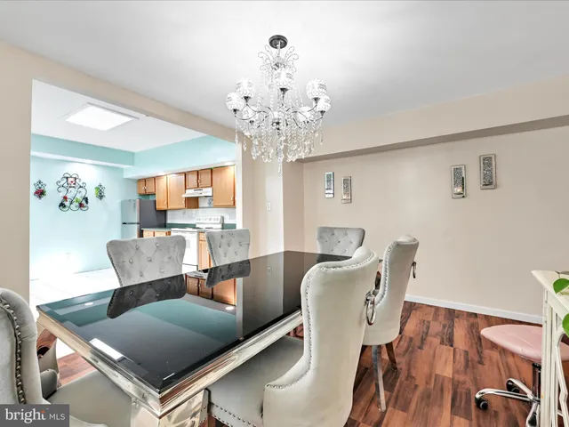 a living room with a table and a window