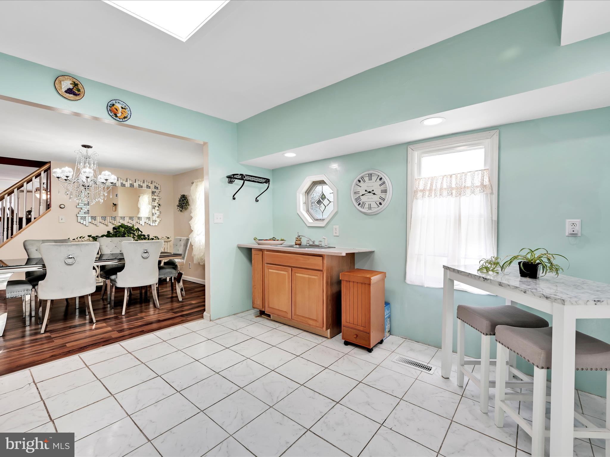 125 West Washington Street Shenandoah, PA 17976 - Photo 16 of 29 a living room with a table and a window