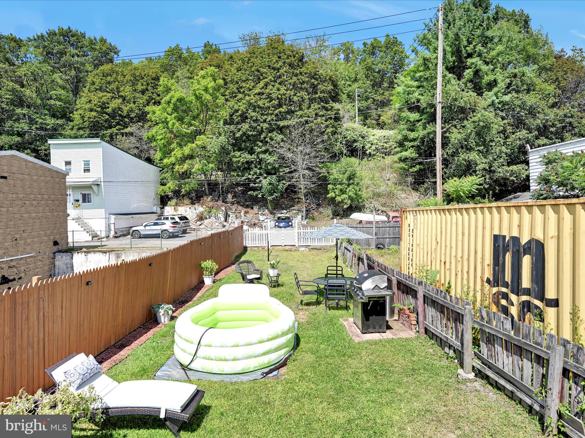125 West Washington Street Shenandoah, PA 17976 - Photo 26 of 29 swimming pool view with a seating space