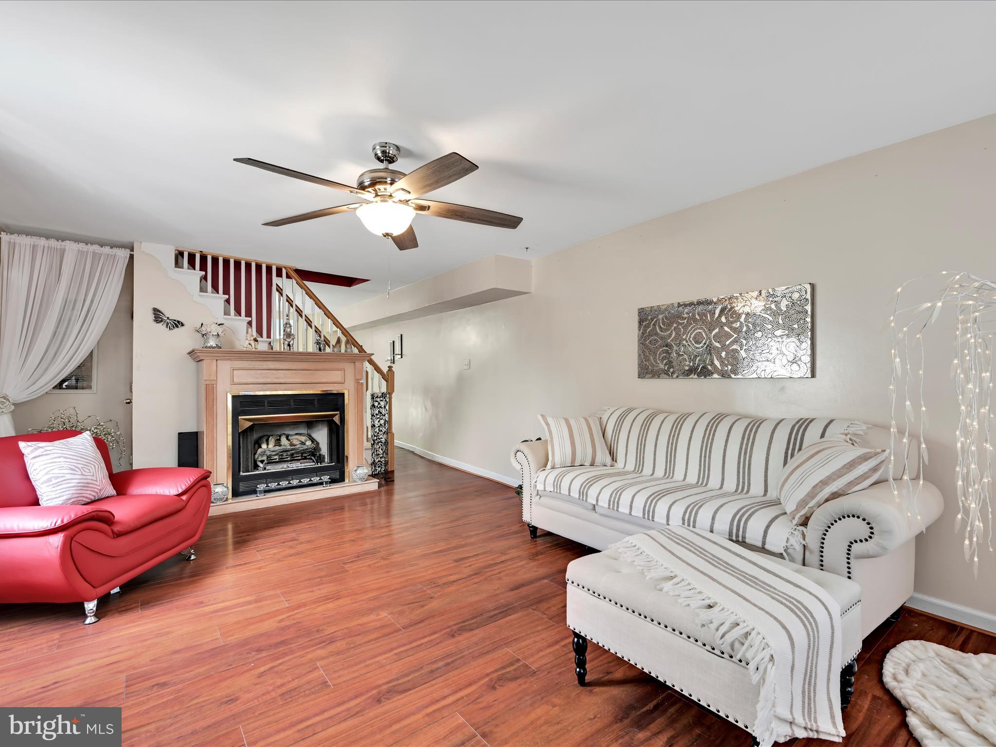 125 West Washington Street Shenandoah, PA 17976 - Photo 10 of 29 a living room with furniture and a fireplace