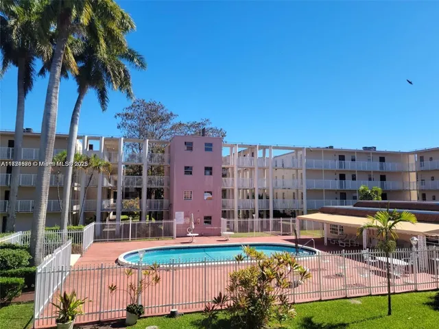 a view of a door car parked in a hallway