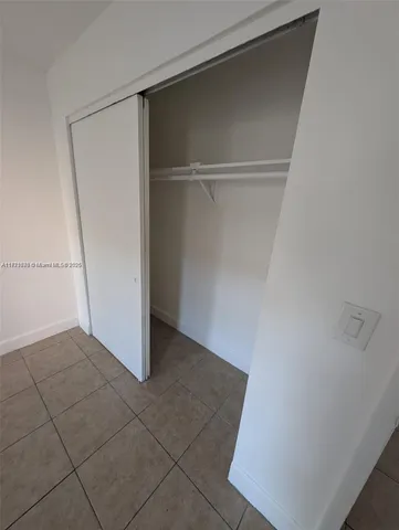 a bathroom with a sink and toilet