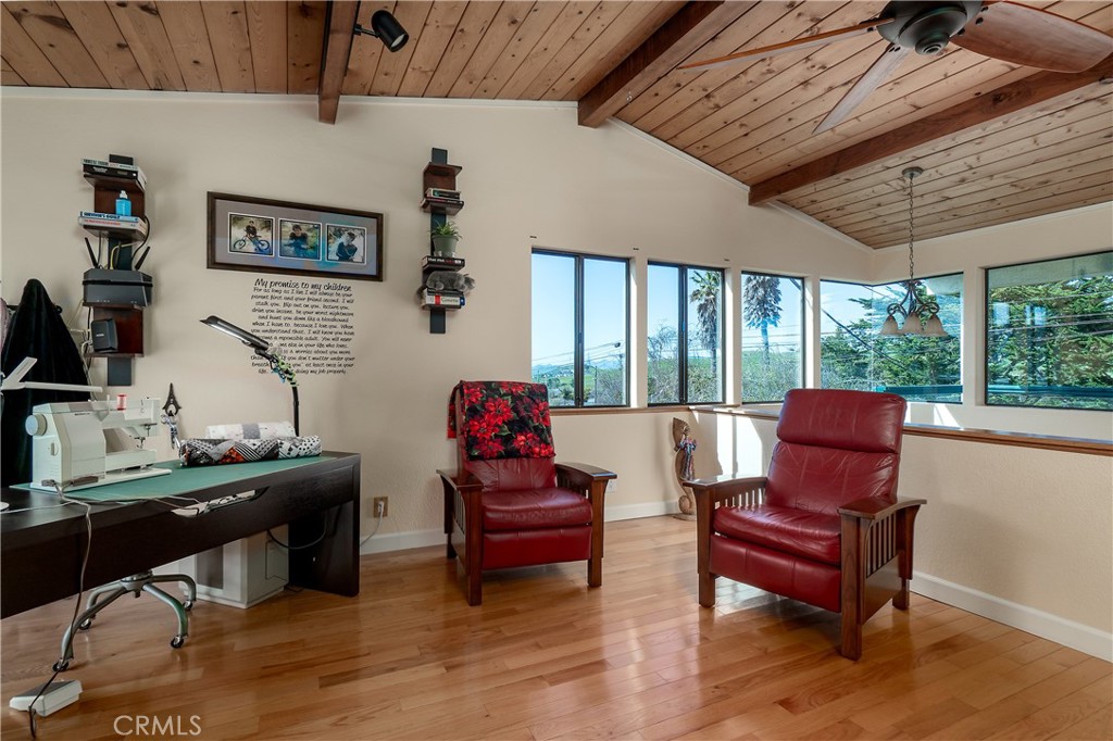 978 Balboa Street Morro Bay, CA 93442 - Photo 15 of 34 a living room with furniture and a large window
