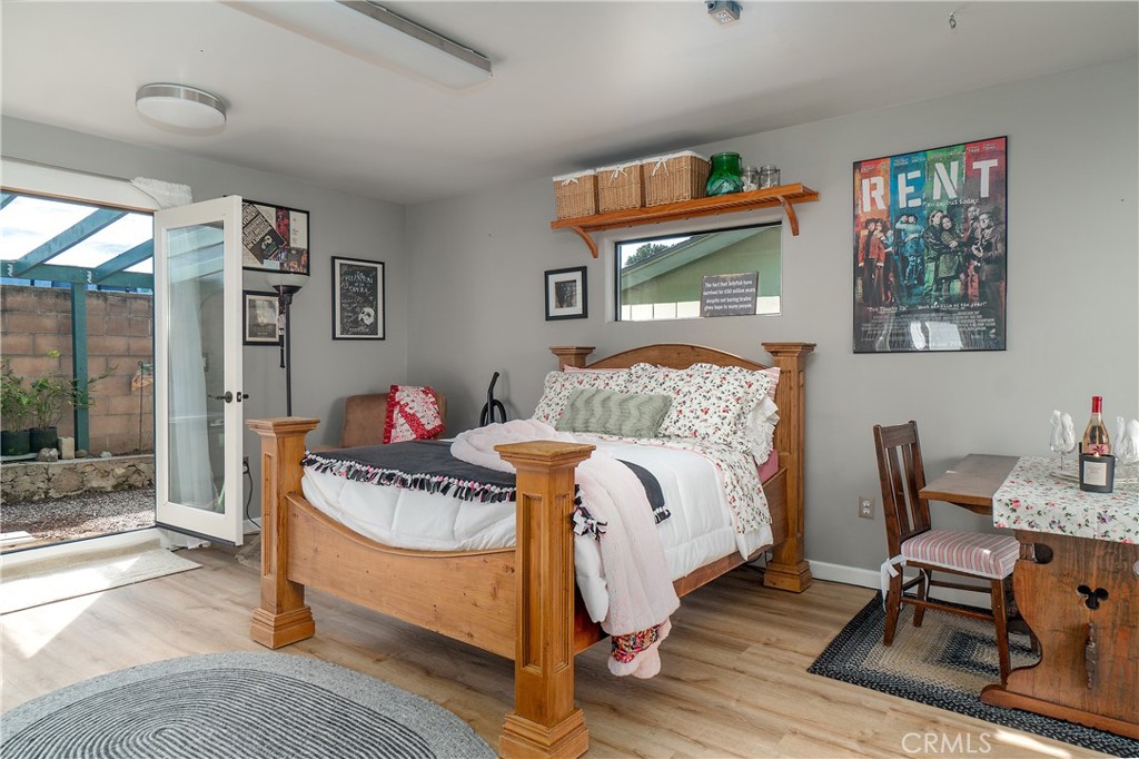 978 Balboa Street Morro Bay, CA 93442 - Photo 27 of 34 a bedroom with furniture and a window