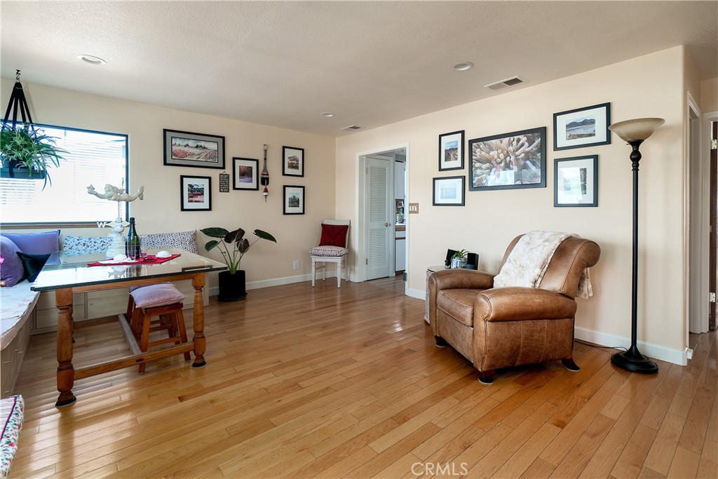 978 Balboa Street Morro Bay, CA 93442 - Photo 4 of 34 a living room with furniture and a wooden floor