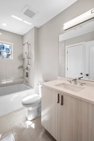a bathroom with a sink a toilet and a bathtub