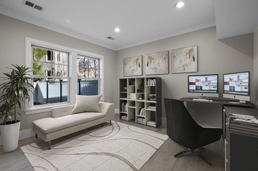 799 Heath Street, Unit 2 Brookline, MA 02467 - Photo 19 of 21 a living room with furniture and a large window
