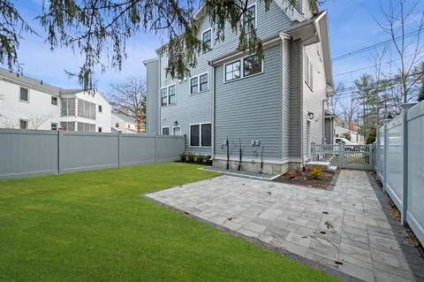 a backyard of a house with lots of green space