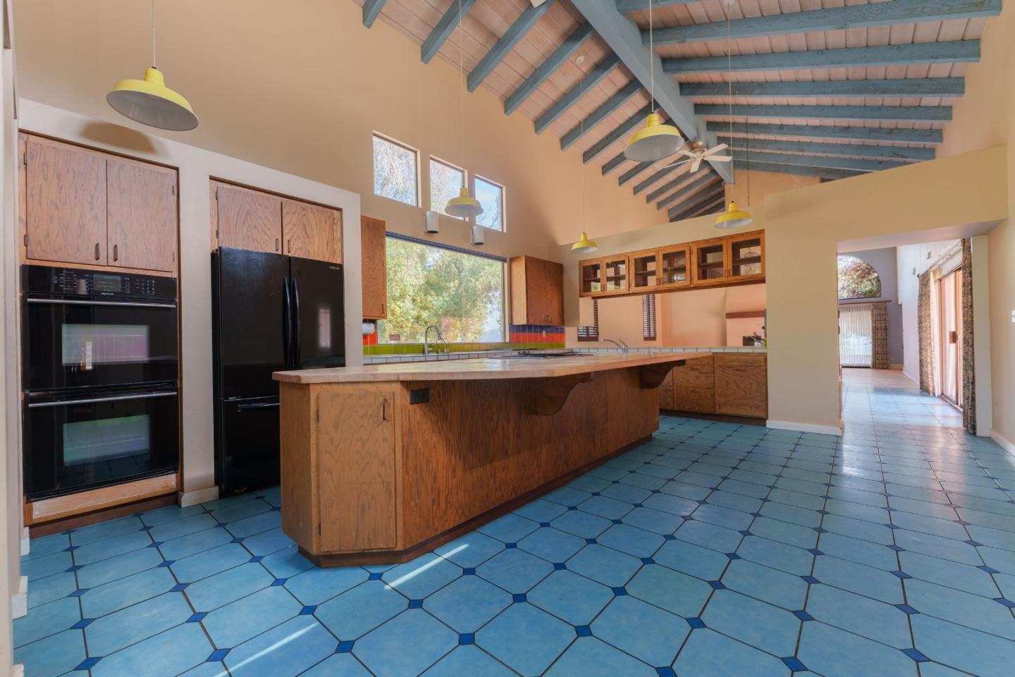 1352 River Road Salinas, CA 93908 - Photo 9 of 33 a kitchen with stainless steel appliances a refrigerator and a stove