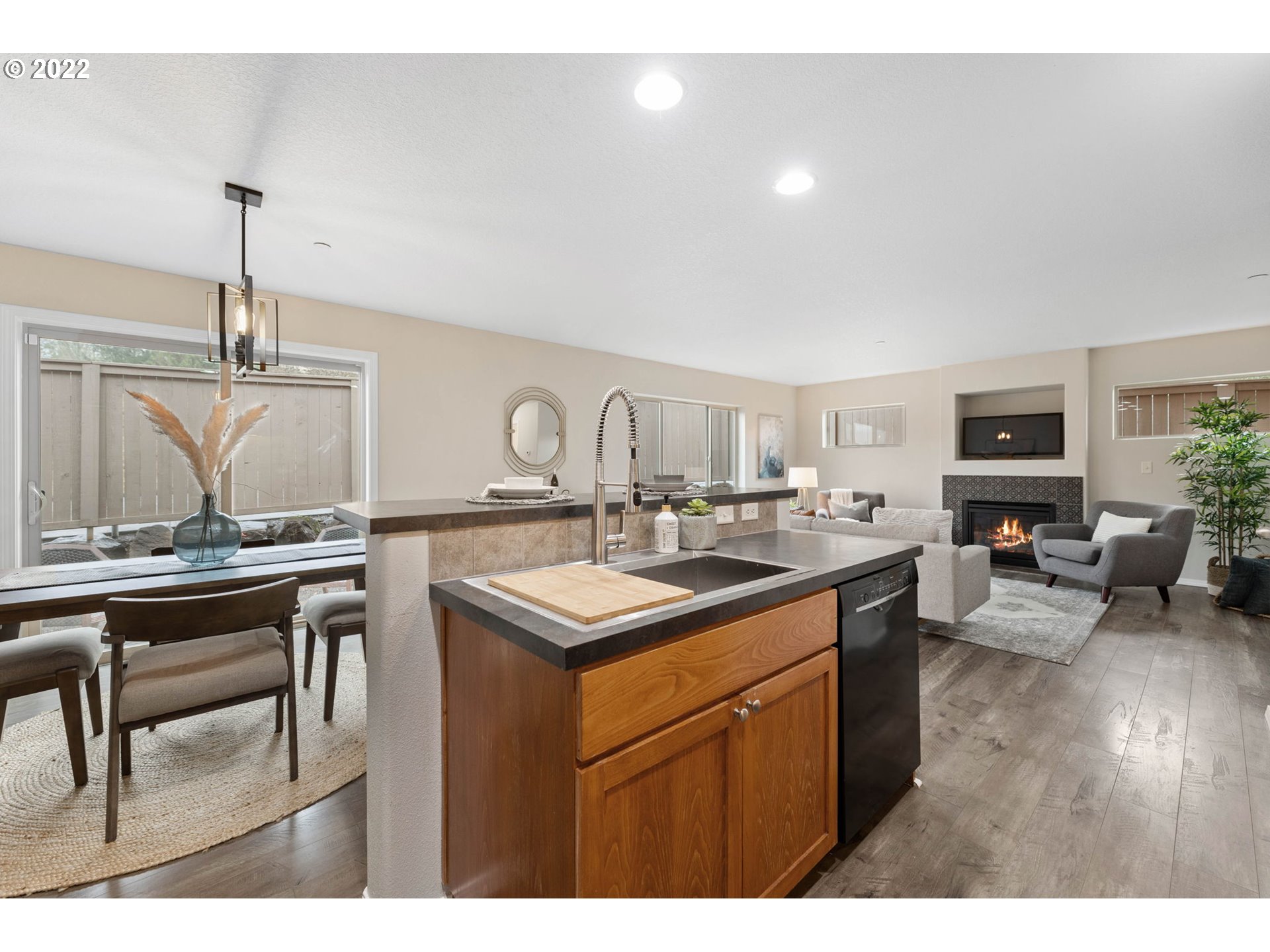 3301 Northwest 47th Drive Camas, WA 98607 - Photo 14 of 32 a kitchen with a sink cabinets and wooden floor