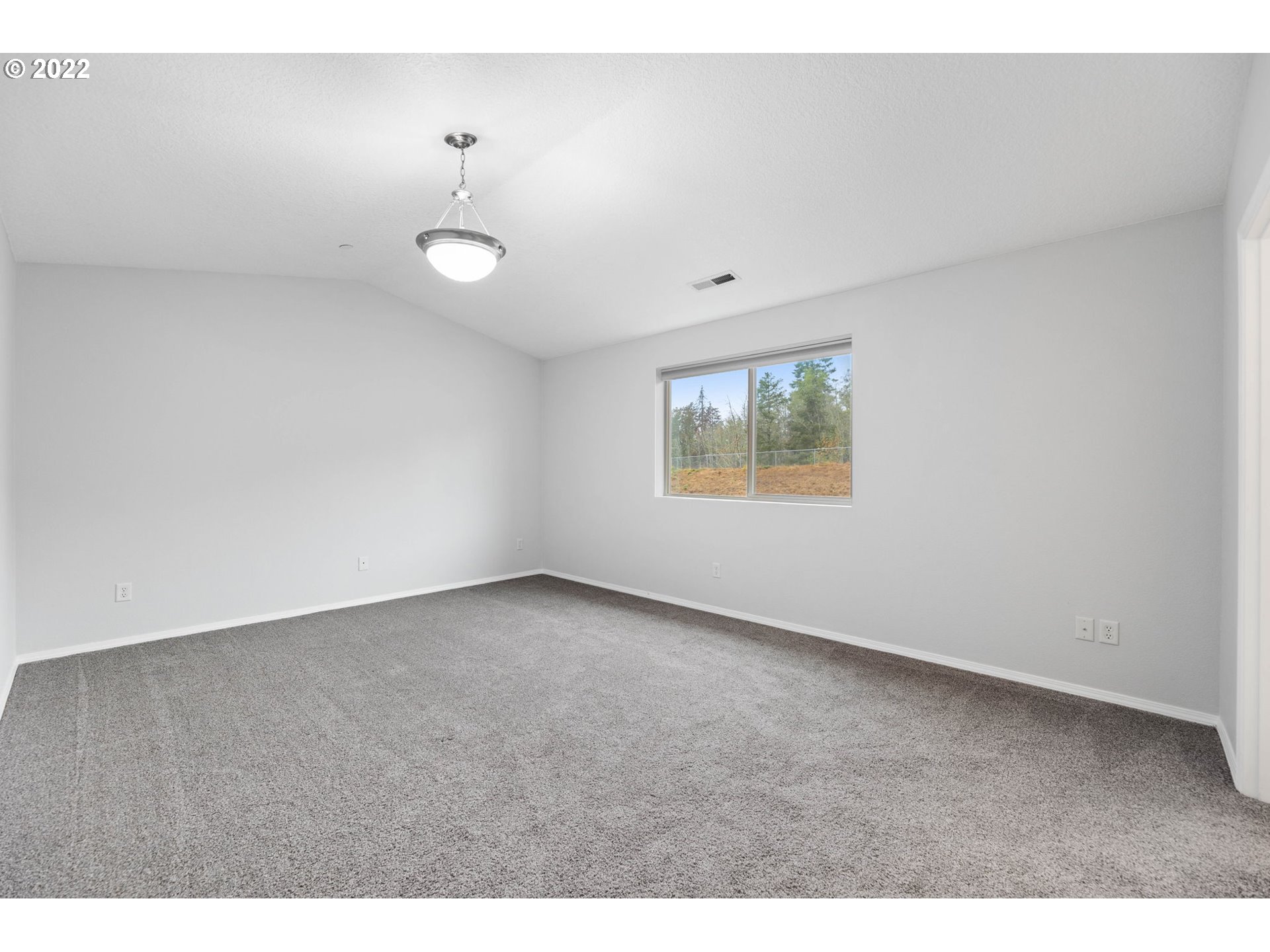 3301 Northwest 47th Drive Camas, WA 98607 - Photo 18 of 32 a view of an empty room with a window