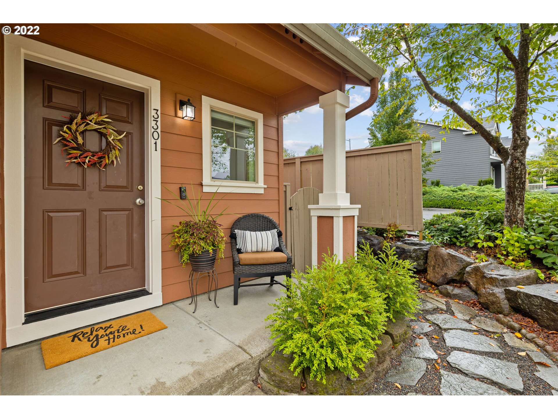 3301 Northwest 47th Drive Camas, WA 98607 - Photo 2 of 32 a backyard of a house with seating space