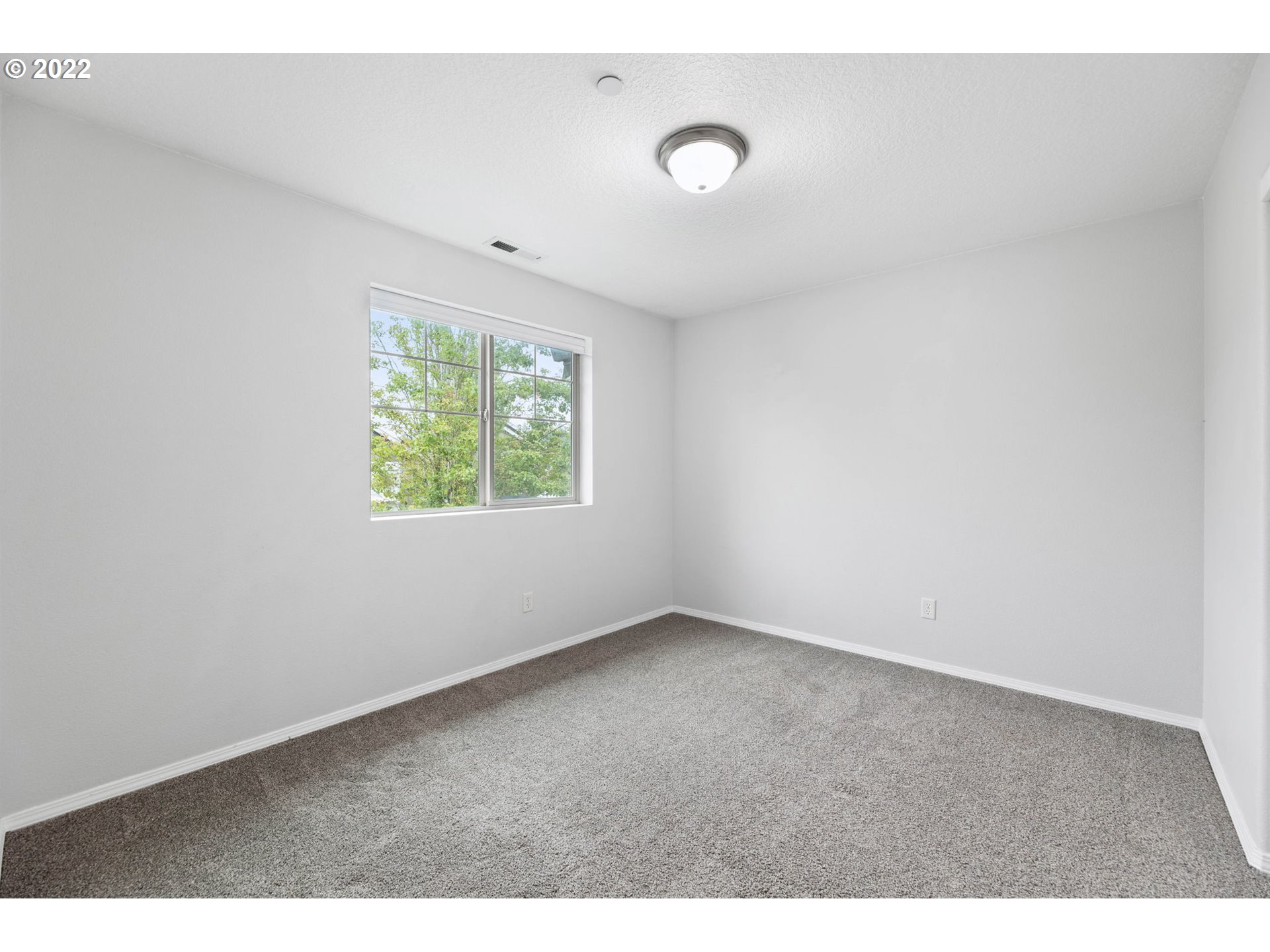3301 Northwest 47th Drive Camas, WA 98607 - Photo 26 of 32 an empty room with windows